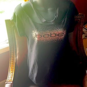 Bebe sexy black top women L good condition large